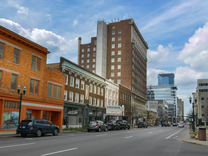 Historic brick buildings and the Kentucky Theatre on Main Street in downtown Lexington.