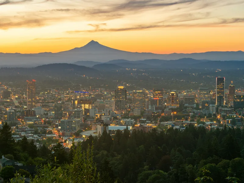 Downtown Portland and Mount Hood at first light, seen from the West Hills.