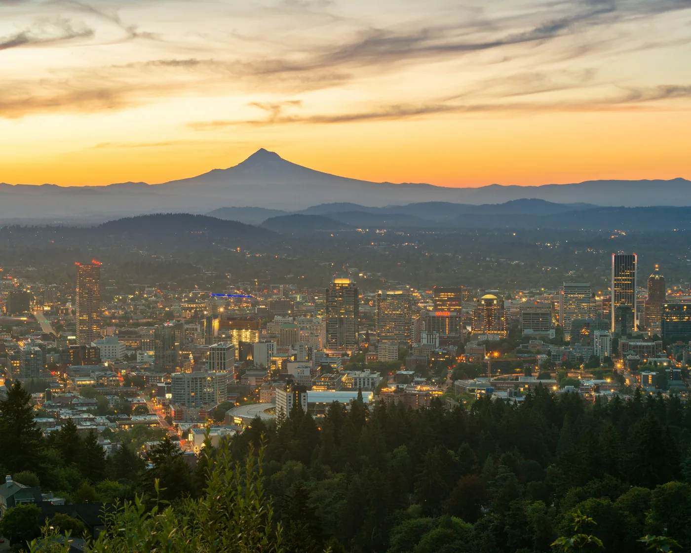 Downtown Portland and Mount Hood at first light, seen from the West Hills.