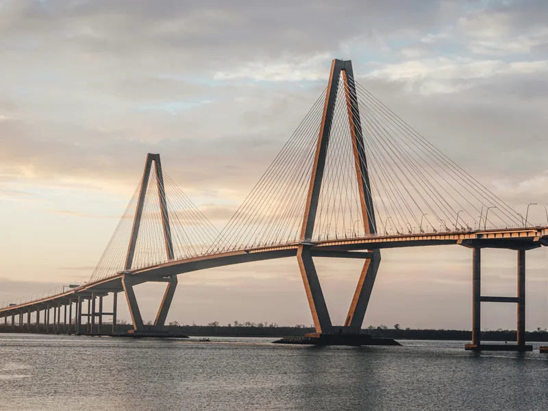 The Arthur Ravenel Jr. Bridge over the Cooper River near Charleston in soft evening light.