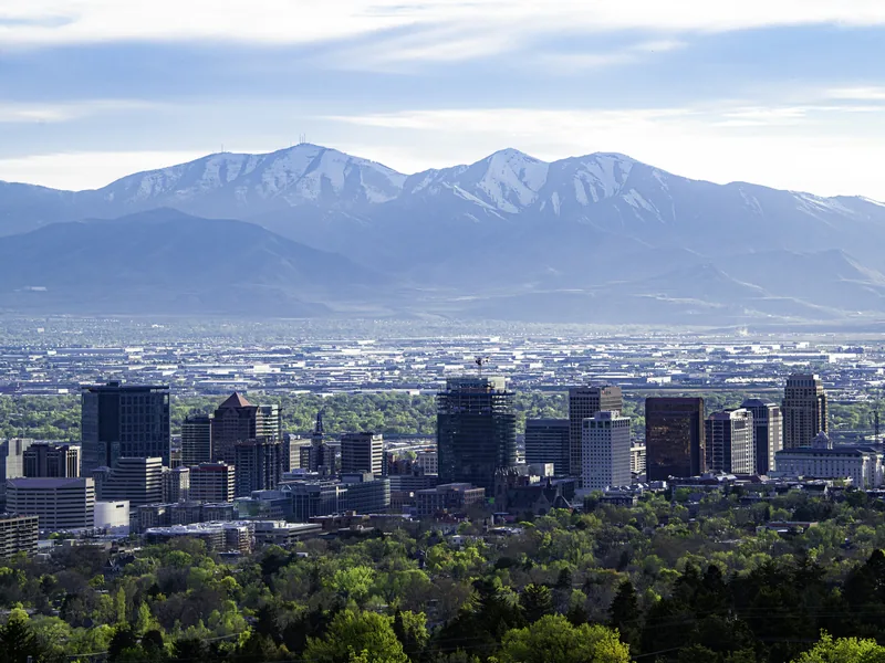 Downtown Salt Lake City in spring, with the Oquirrh Mountains behind, from the top of Virginia Street.